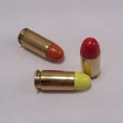 ZBIJAK - Łuska MOS kal. 9x19mm Luger, pocisk kolor, atrapa naboju bez prochu i spłonki (Zbijak 9x19 Łuska Mosiężna)